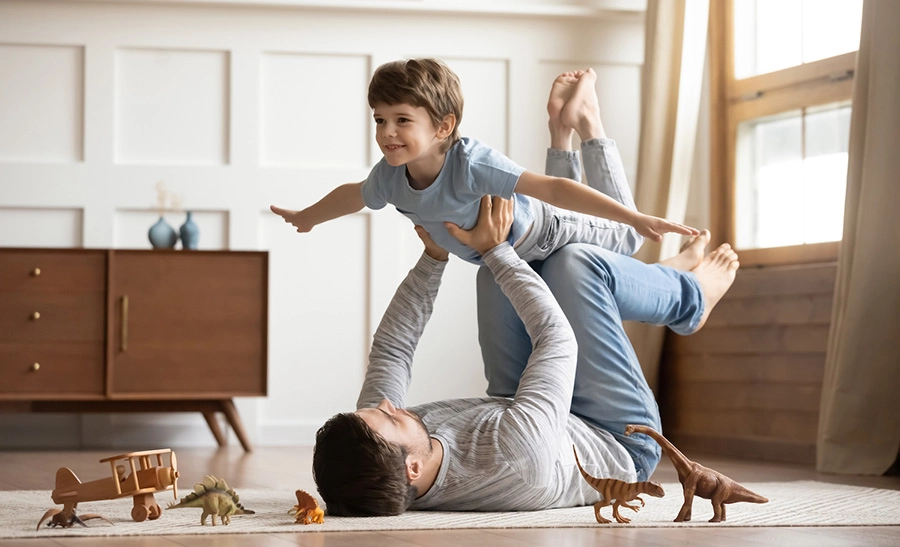 boy-and-dad-hero-compressed father and son playing