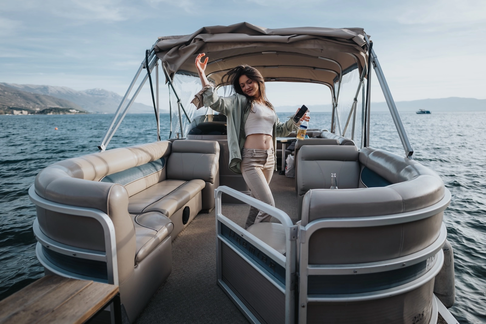 pontoon_boat Lady in a pontoon boat